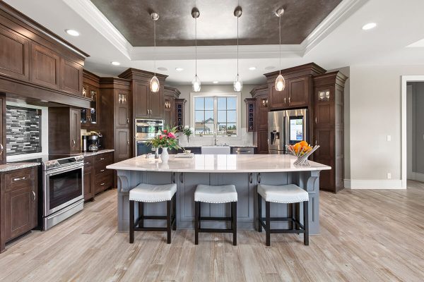 Modern kitchen features dark wood cabinetry